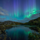 Image for article titled Mesmerizing Aurora in Dramatic Landscapes of Fire, Ice, and Shadow